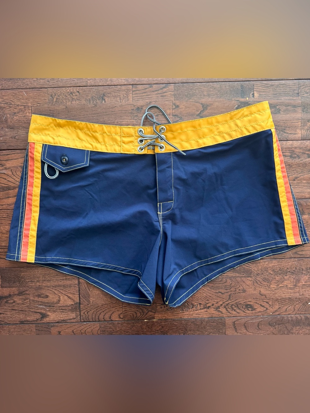 Birdwell Retro Navy Board Shorts Yellow Waistband and Red-Orange Side Stripes